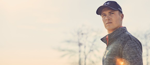 Jordan Spieth posing in Under Armour gear
