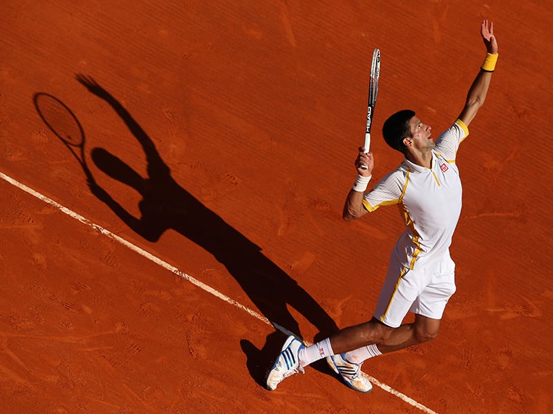 Novak Djokovic prepares for a serve.
