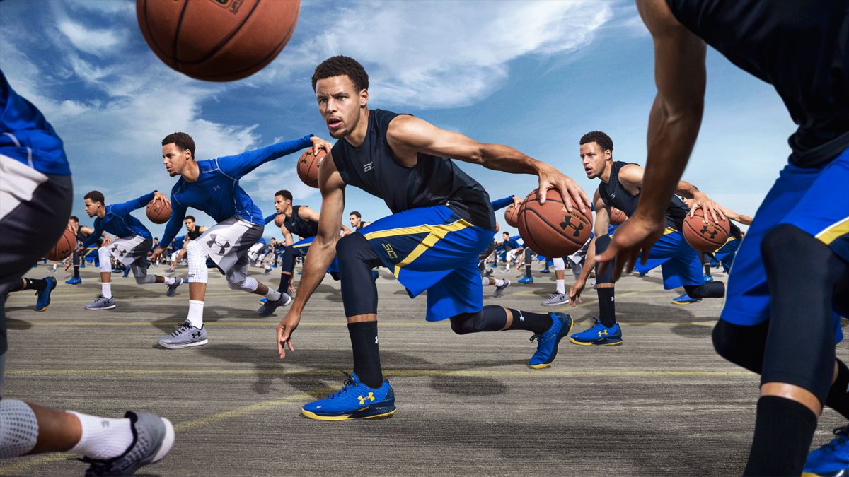 Multiple images of NBA star Steph Curry dribbling a basketball in Under Armour gear.