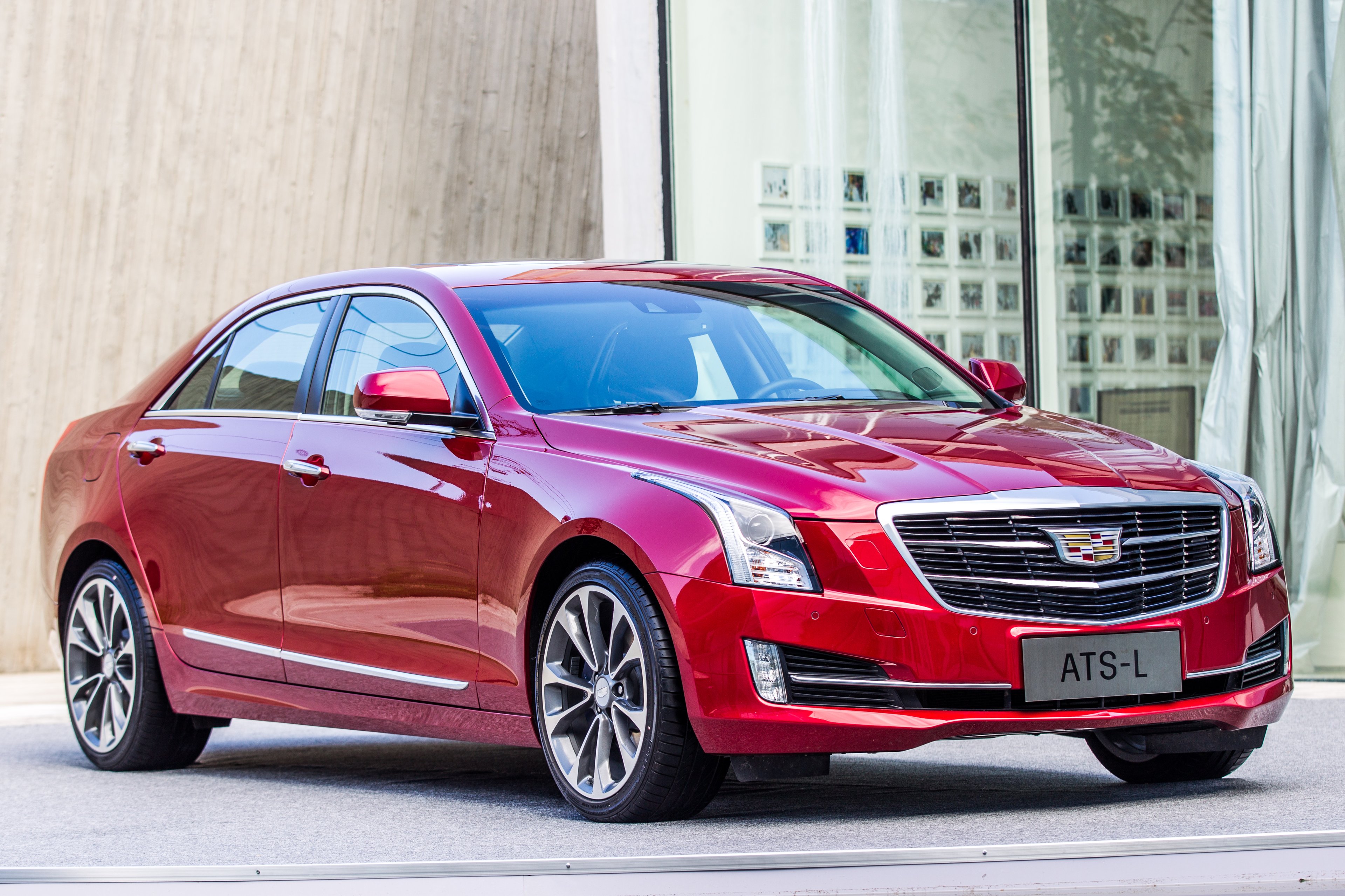 A red Cadillac ATS-L sedan.