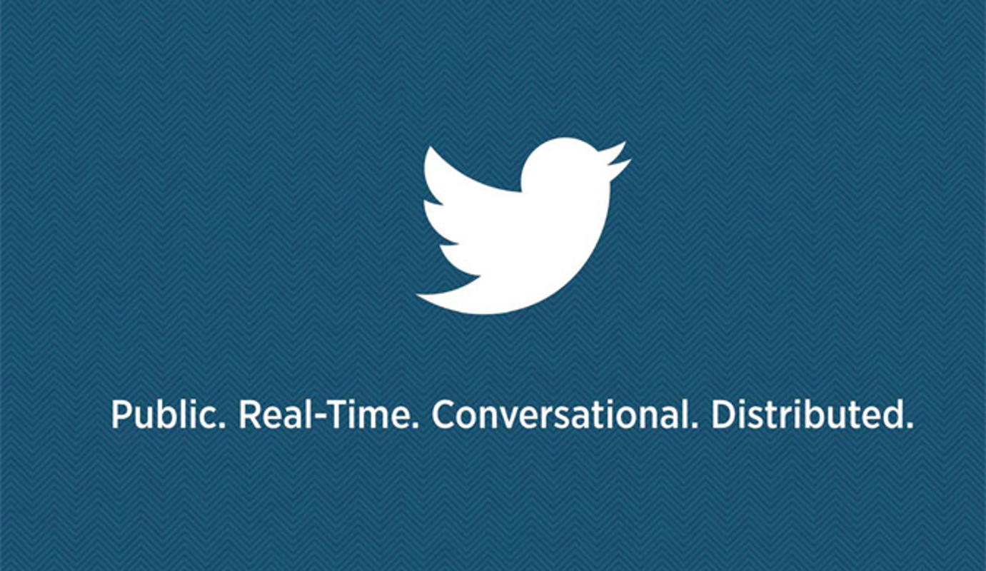 White Twitter bird on a dark blue background, above this text in white: "Public. Real-time. Conversational. Distributed."