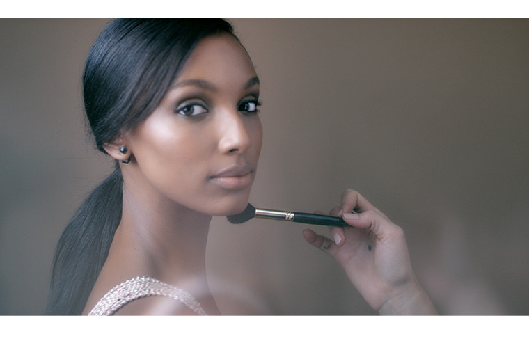 Woman having makeup applied
