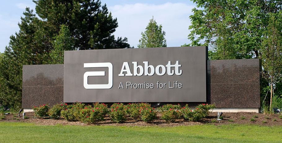 Abbott Labs sign with logo and slogan.