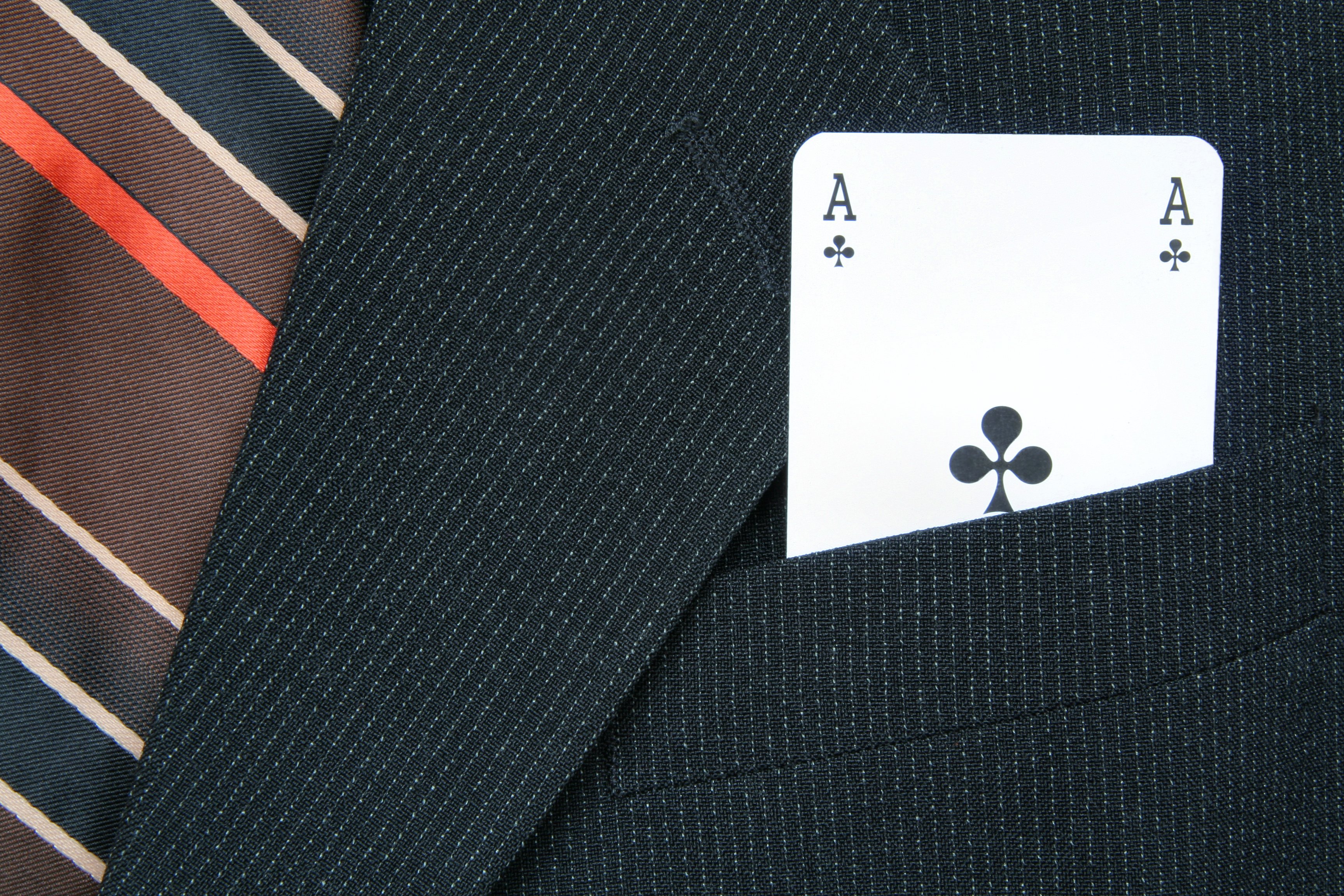 Ace of clubs in coat pocket