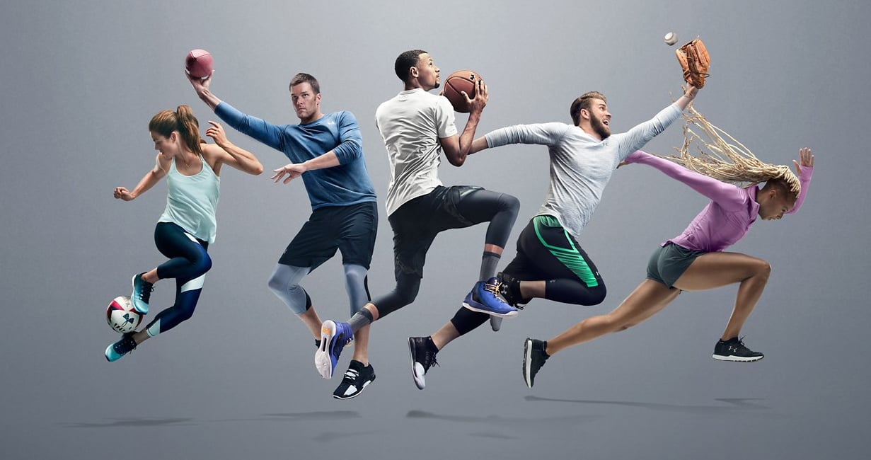 Five star Under Armour athletes -- Kelley O'Hara, Tom Brady, Stephen Curry, Bryce Harper, and Natasha Hastings -- all in action poses and wearing Under Armour Threadborne clothing against a grey background.