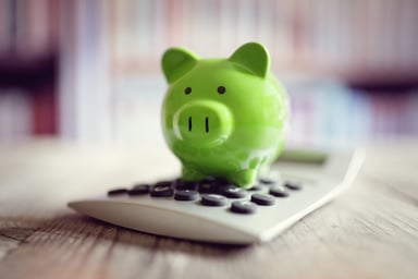 piggy bank with calculator_GettyImages-611086620