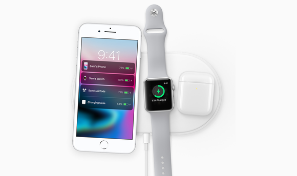 iPhone 8, Apple Watch, and AirPods charging wirelessly