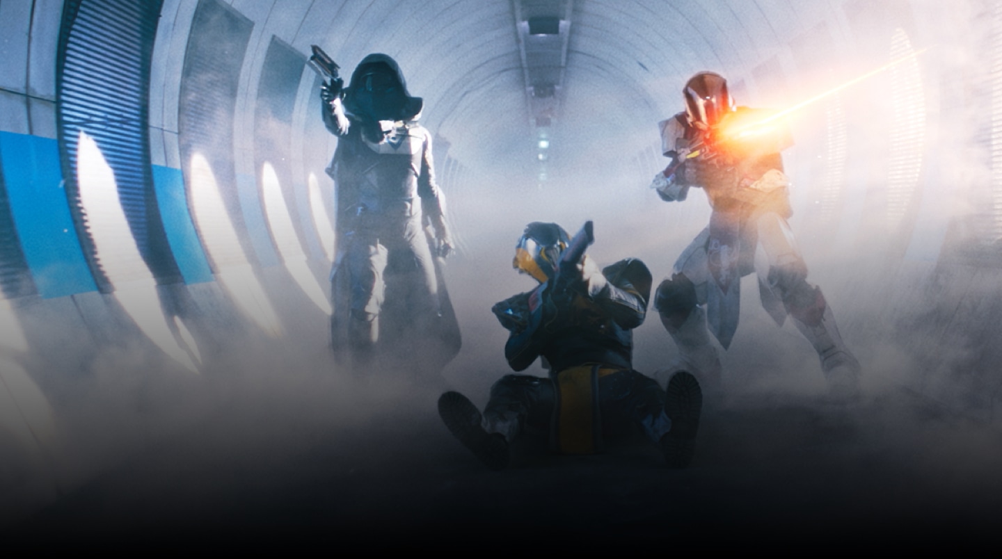 Three characters from "Destiny 2" holding guns inside of a smoke-filled tunnel.