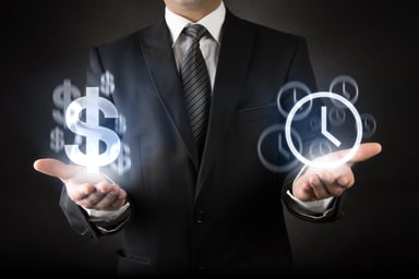 Man holding dollar symbol and clock