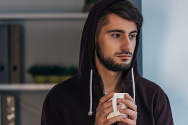 serious man with hoodie_GettyImages-514380024