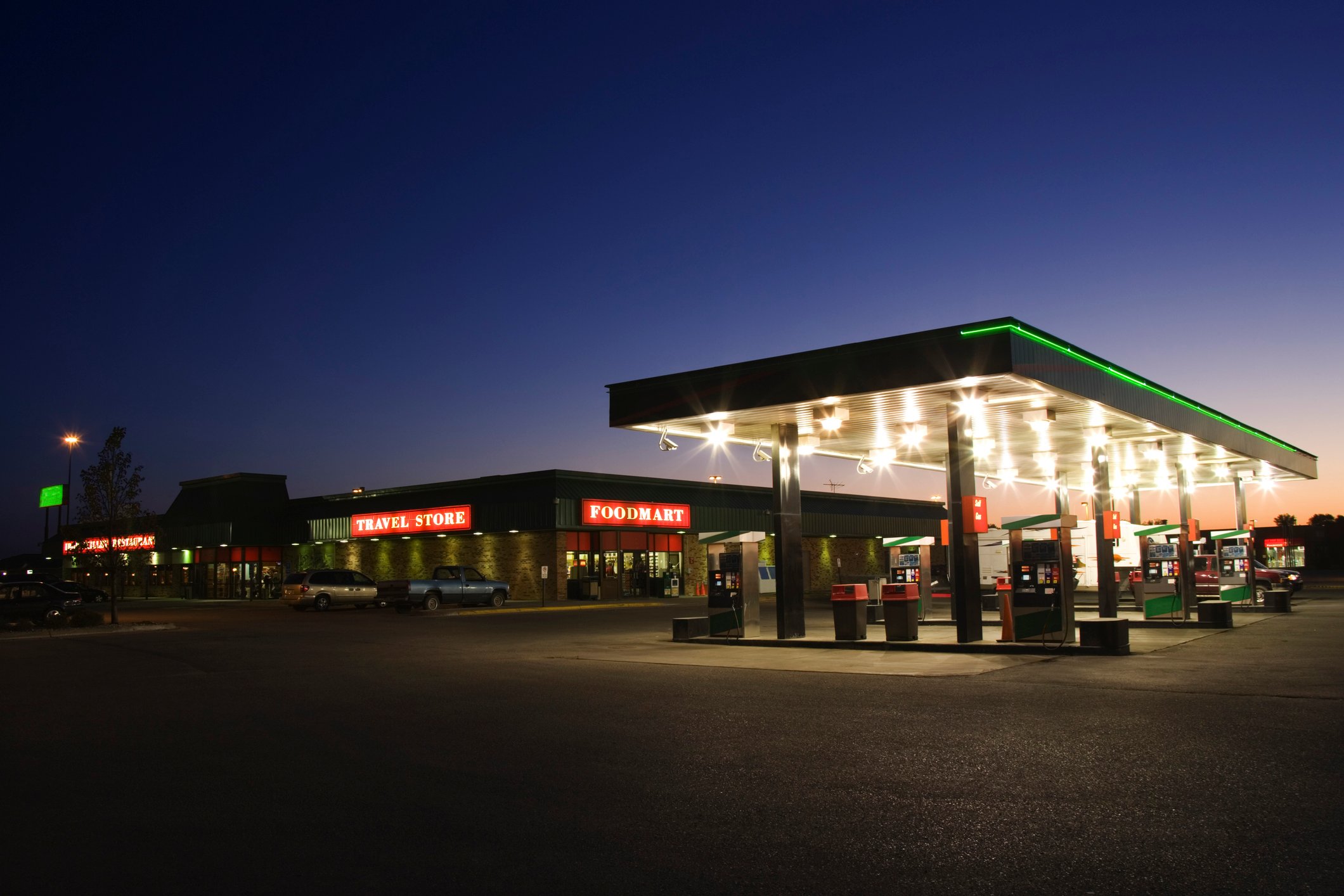 A gas station at night.