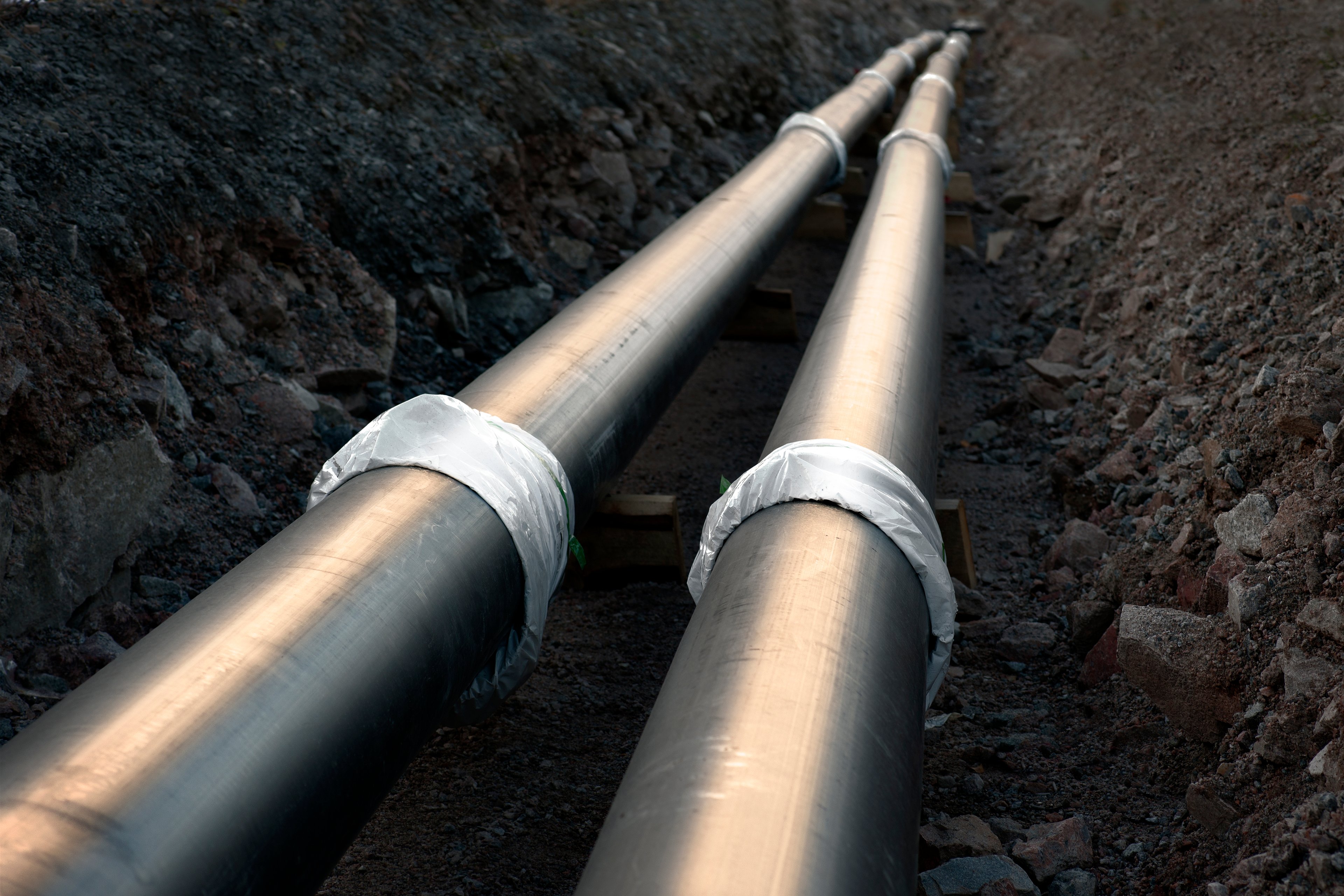 A pipeline in a ditch at a construction site.