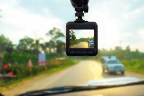 A DVR dash cam recording the road.