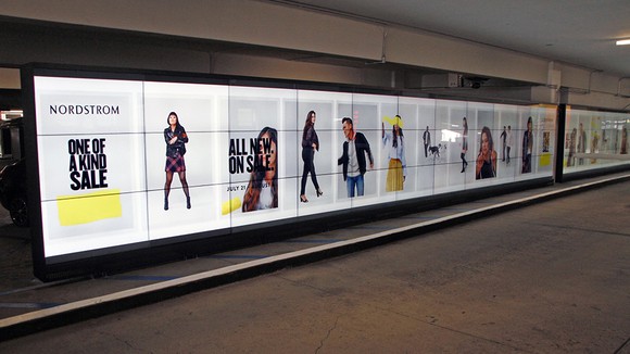 Outfront Media advertisements in a parking garage.