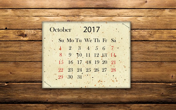 October 2017 calendar on wooden wall