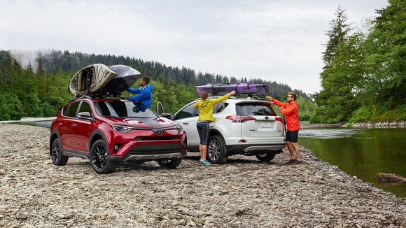 Friends with Toyota Rav4's by a river