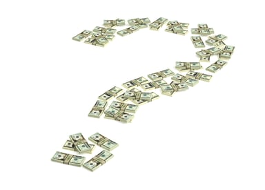 Question mark made of stacks of money
