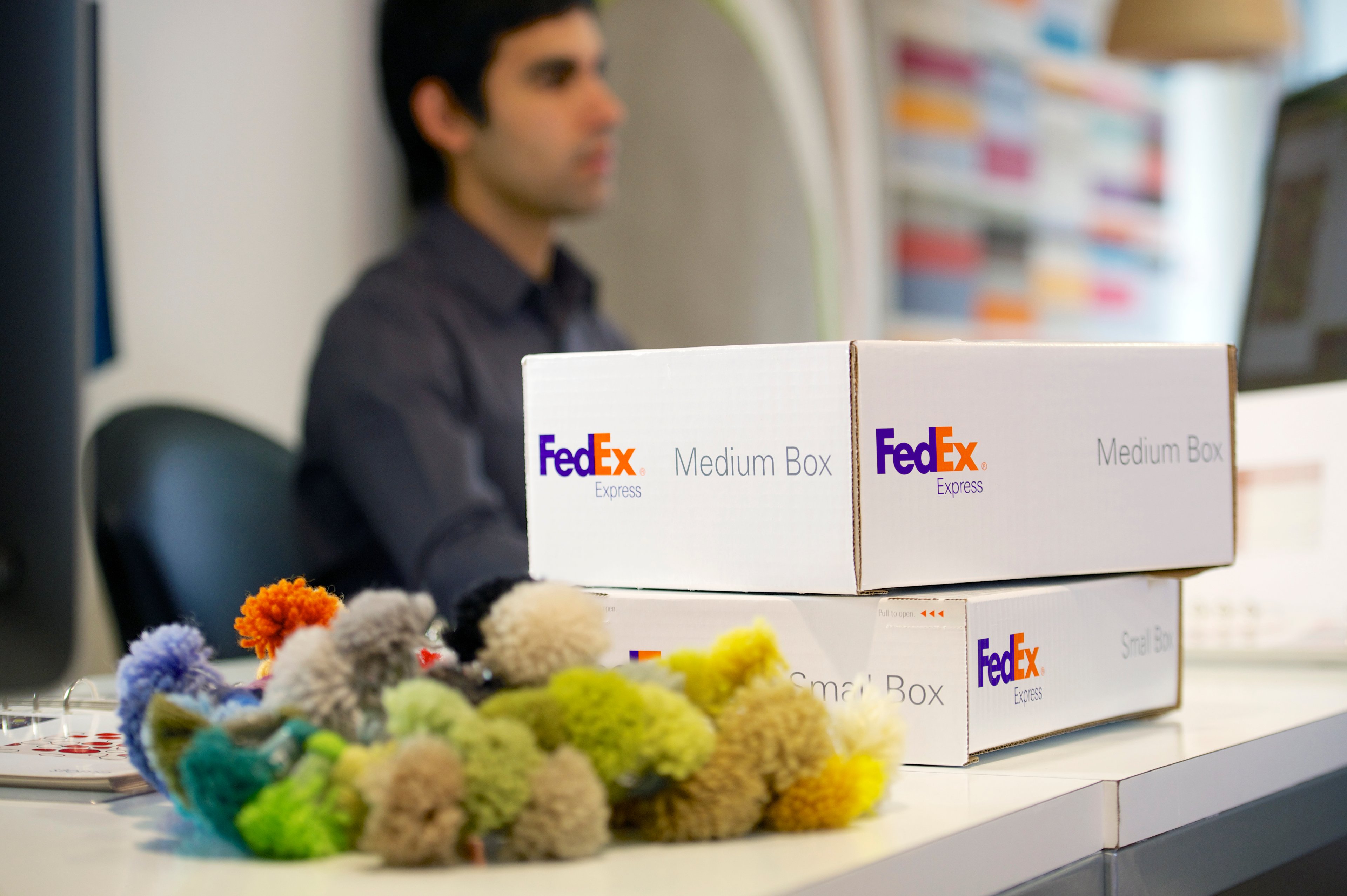 FedEx packages on a desk