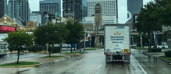 The back of a Wal-Mart truck on a city street