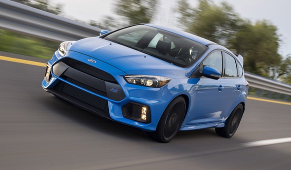 A blue 2017 Ford Focus RS on a highway. 