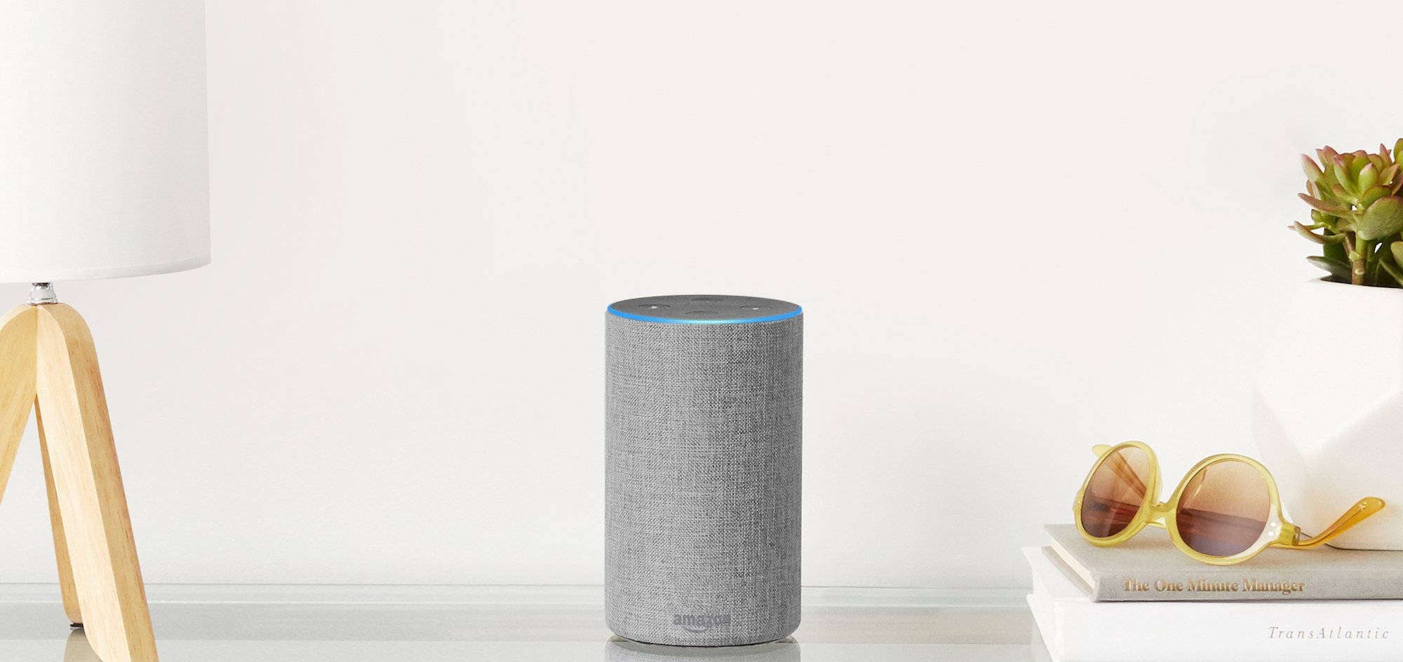 Amazon Echo sitting on a table.