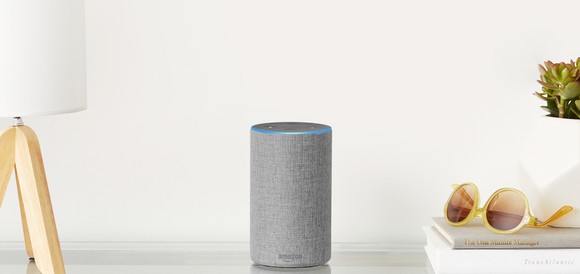 Amazon Echo sitting on a table.