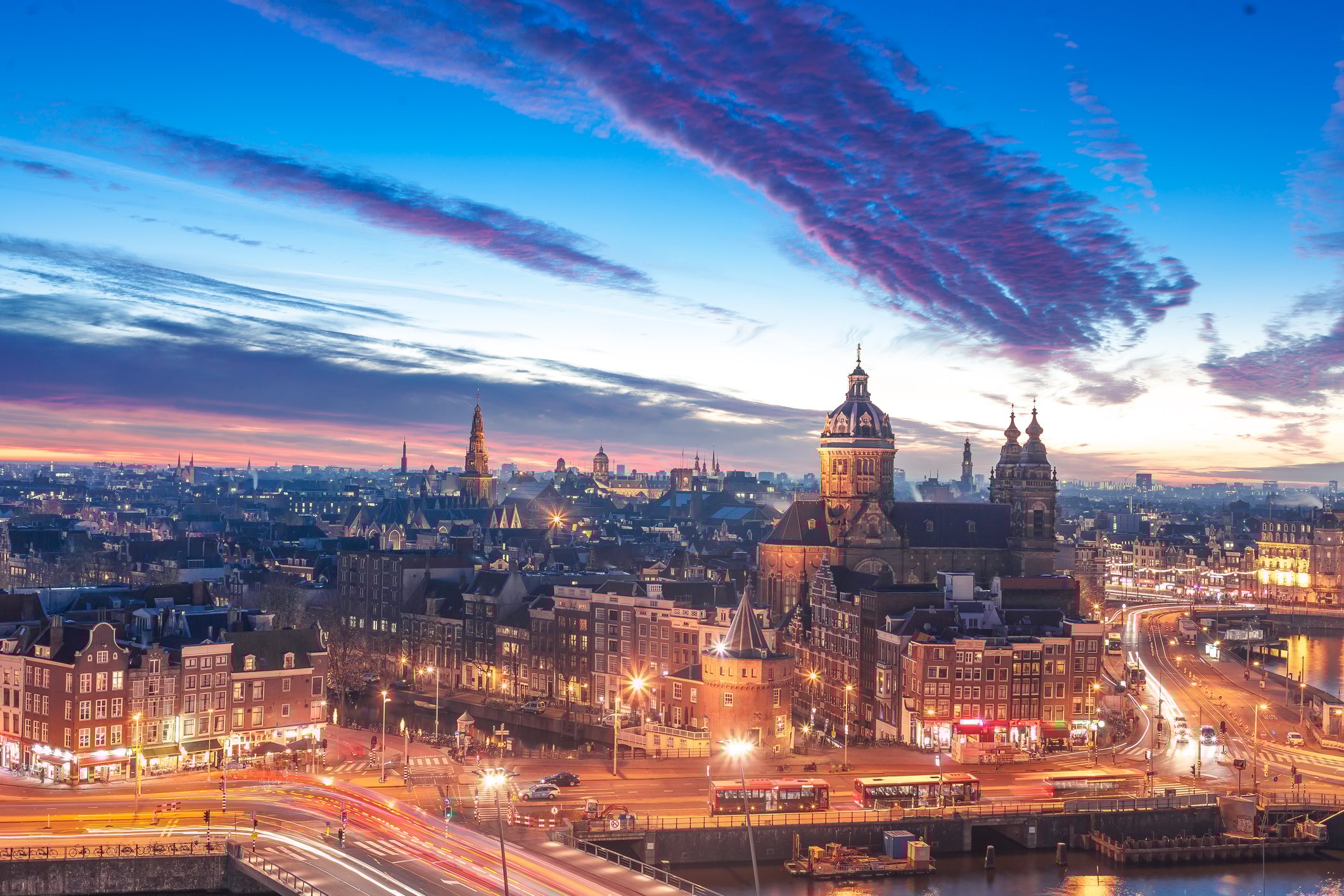 Amsterdam skyline at night.