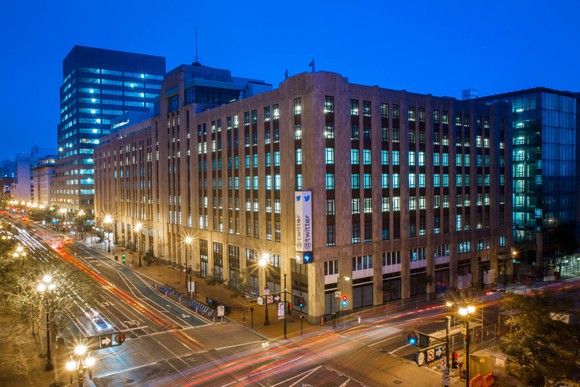 Exterior of Twitter HQ at night.