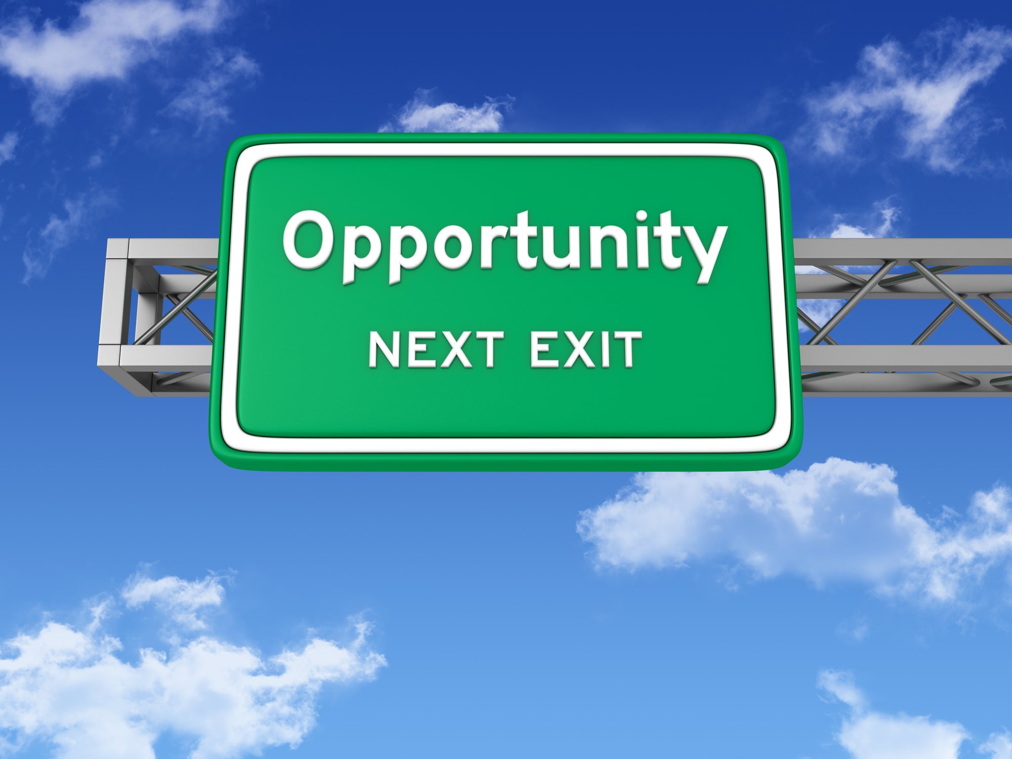 A green highway sign against a blue sky reads "opportunity next exit."