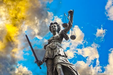 Lady justice in the clouds