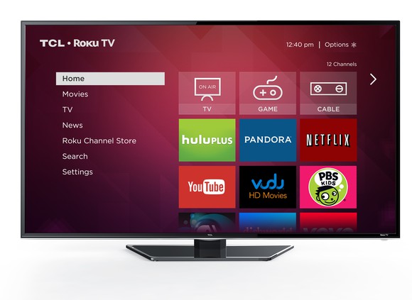 A TCL television displaying the home screen for the Roku TV platform.