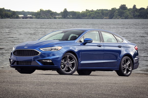 A blue 2017 Ford Fusion Sport midsize sedan.