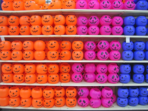 A wall of plastic jack-o-lanterns