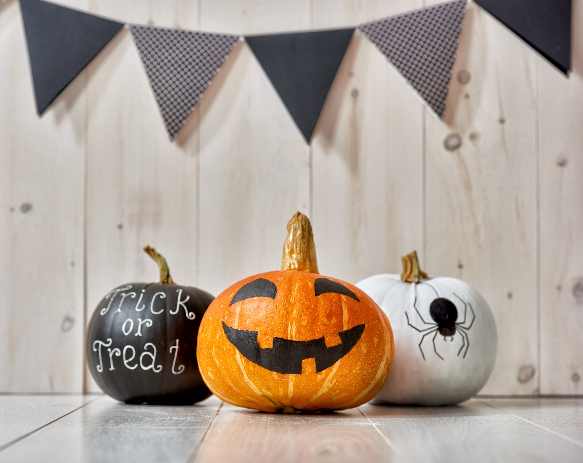 Three decorated pumpkins