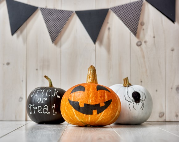 Three decorated pumpkins