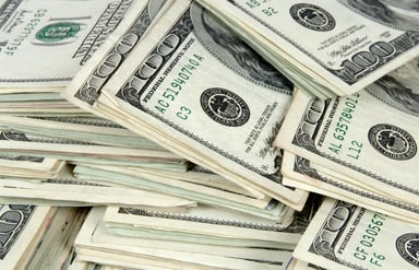 GettyImages-stacks of hundred dollar bills