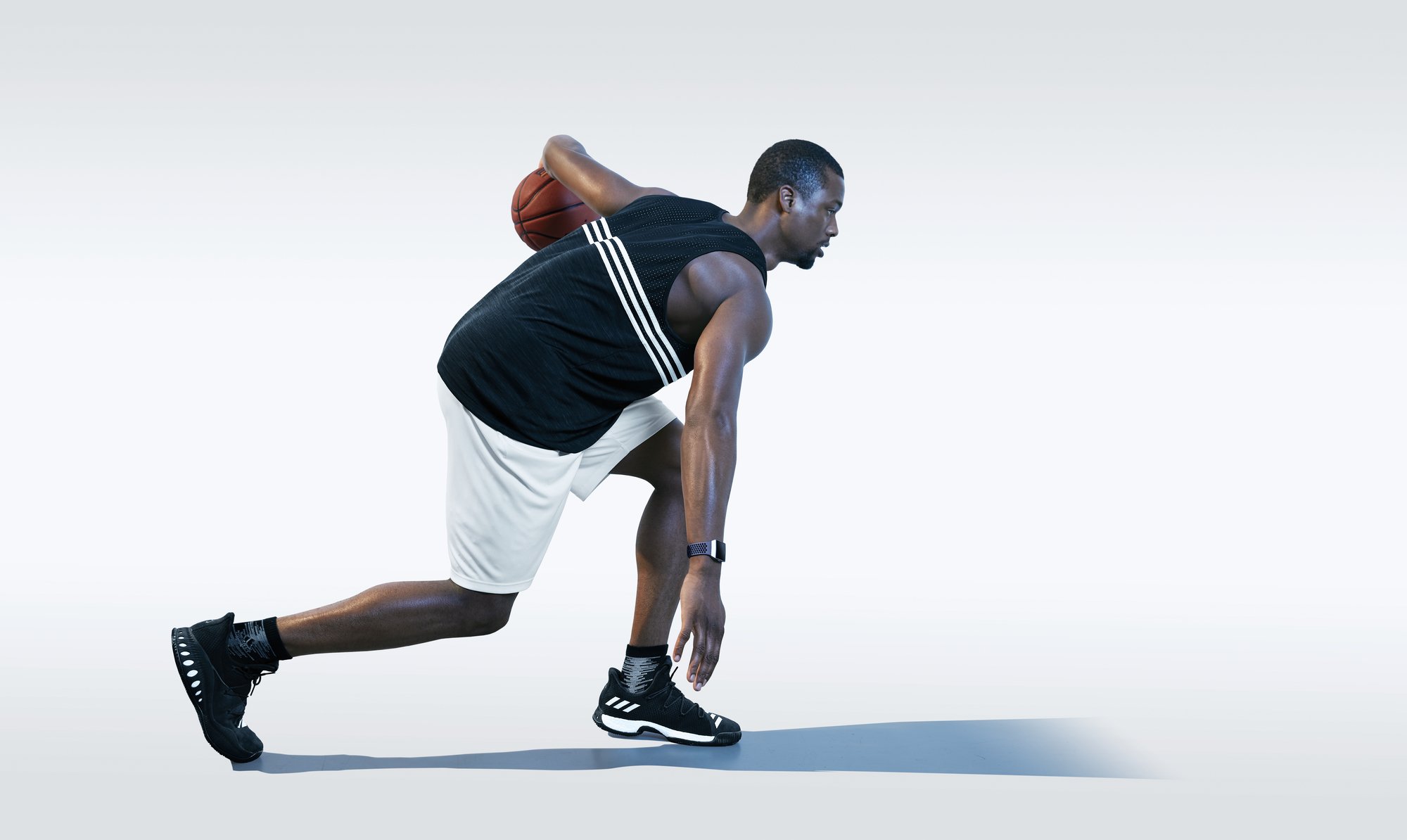 Basketball player Harrison Barnes in adidas gear sporting the new Fitbit Ionic watch