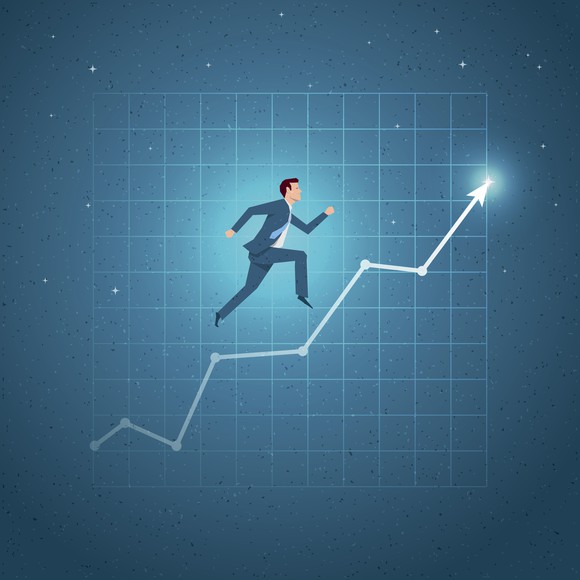 Man running up an upward-moving stock chart.