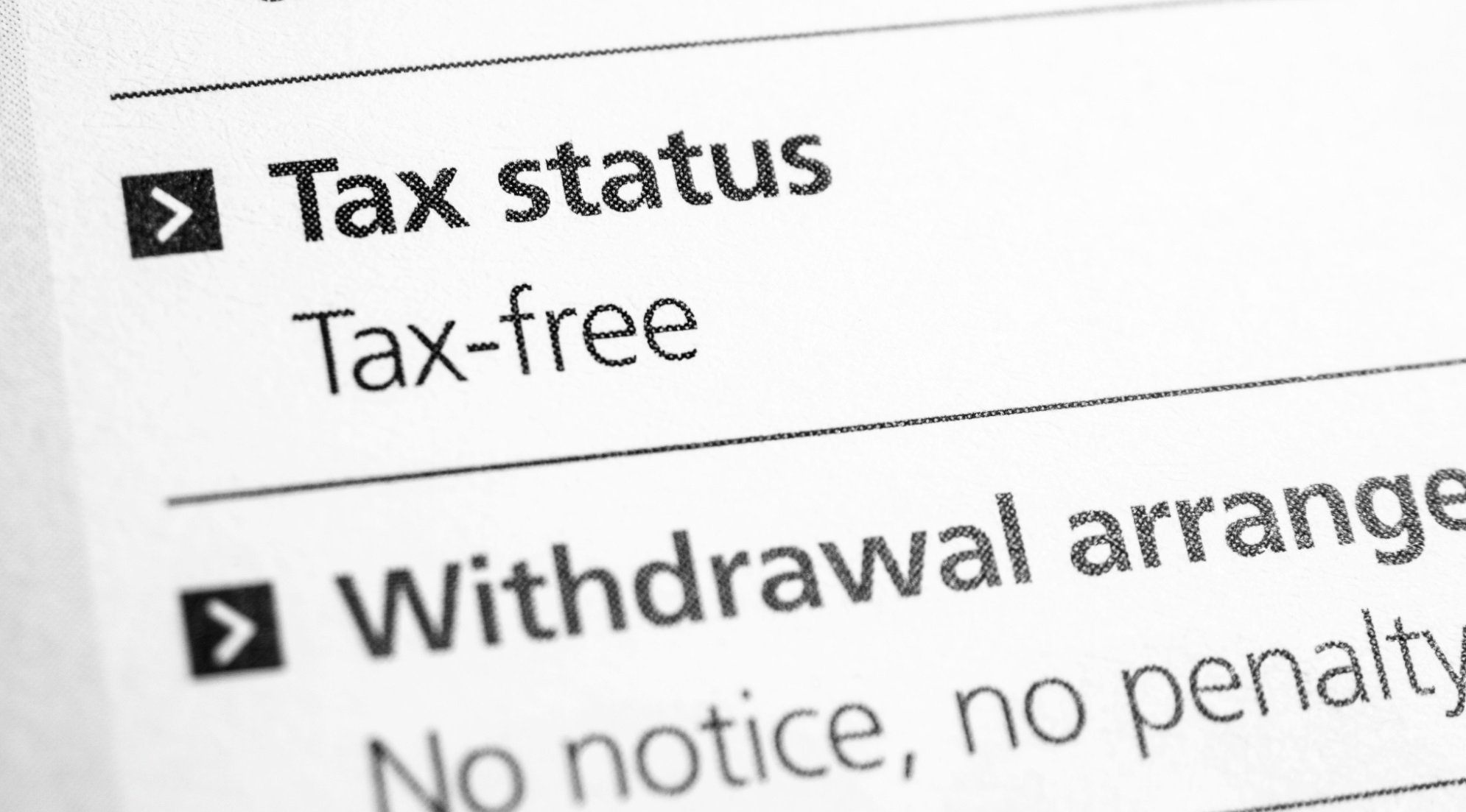 A document with tax status details printed on it. 