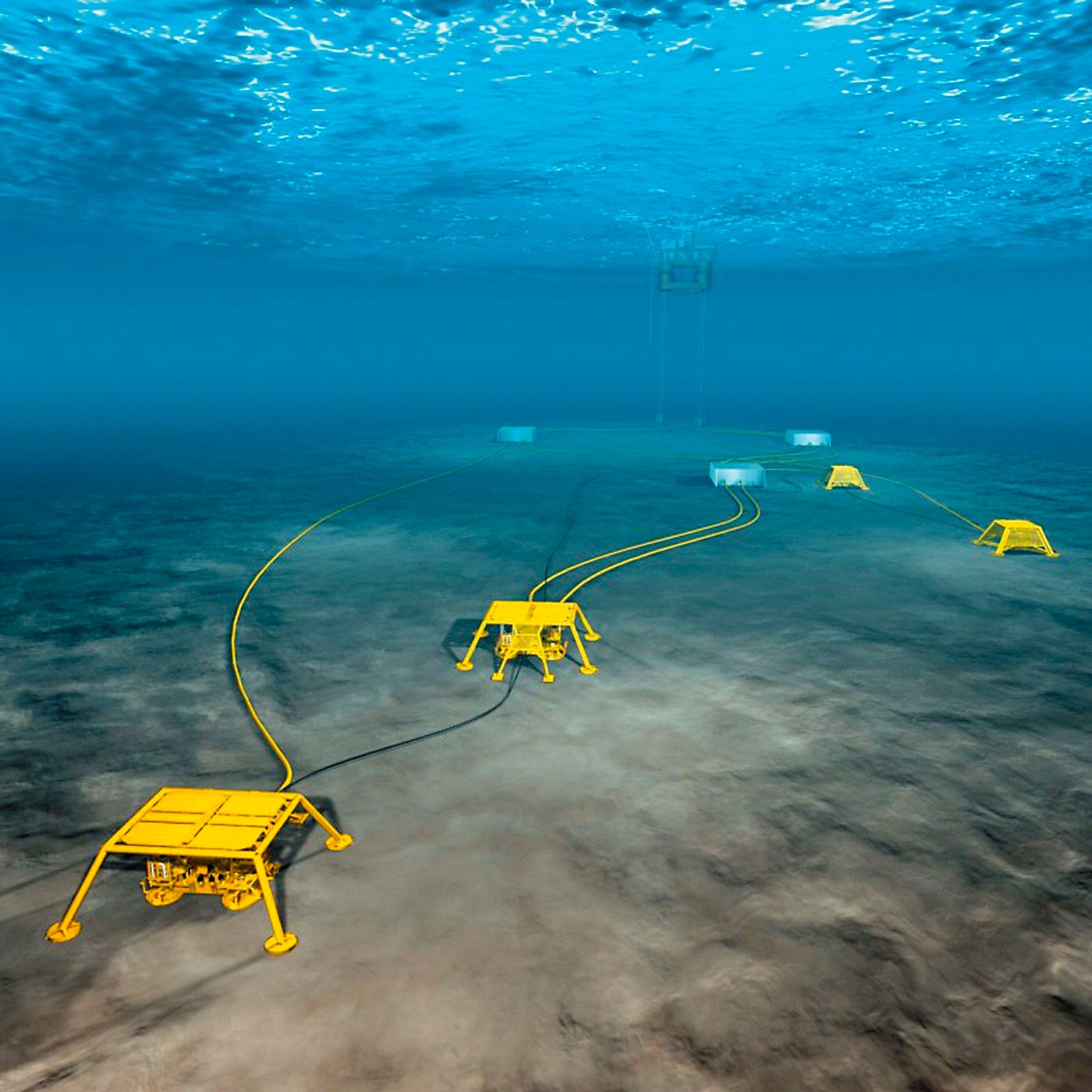 Yellow sensor units placed in shallow water on the ocean floor.