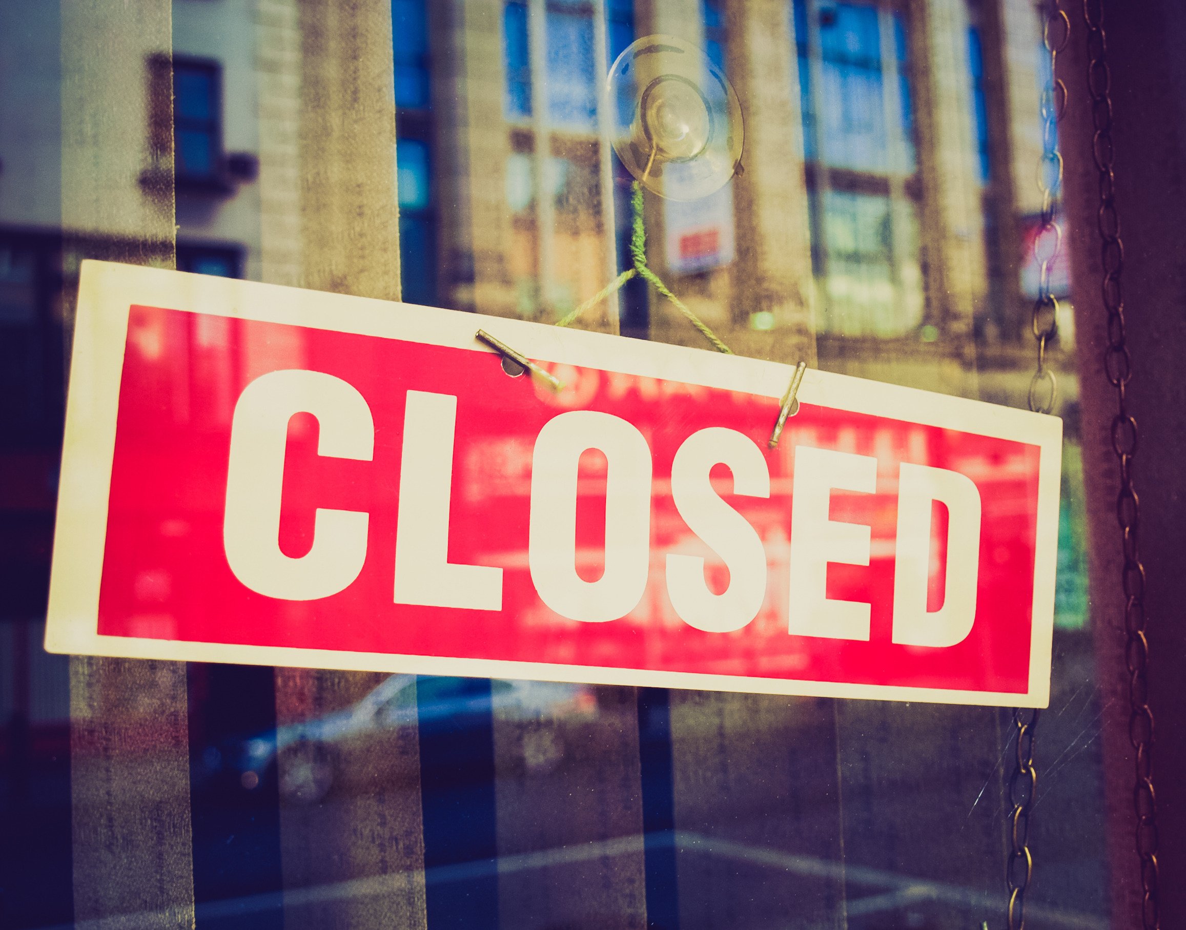 Closed sign in store window