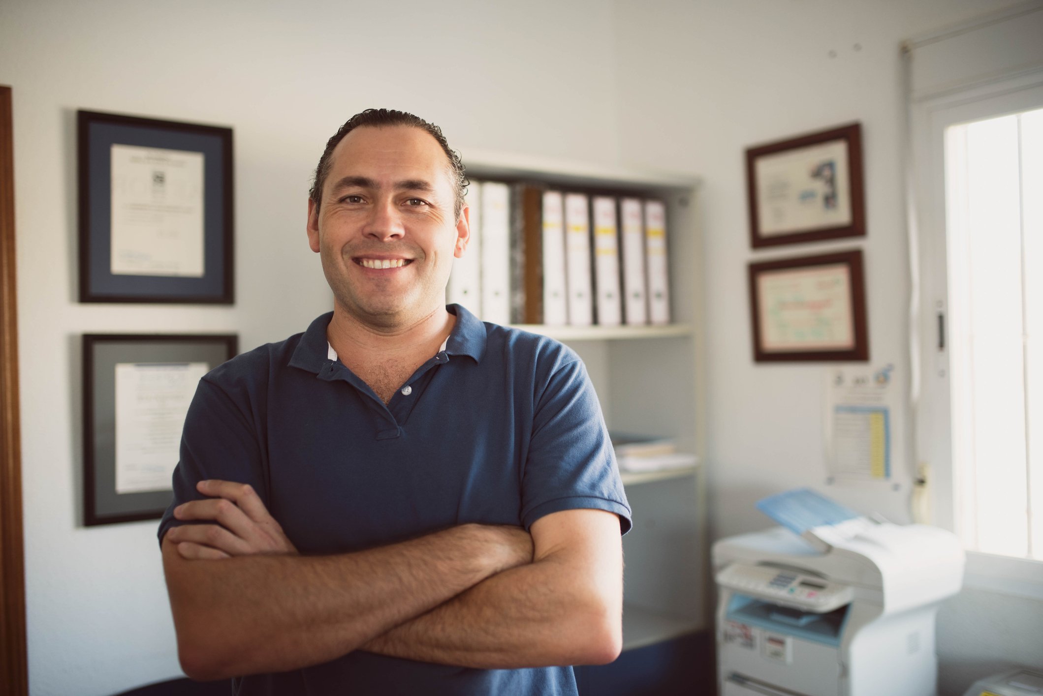 Smiling man in polo shirt
