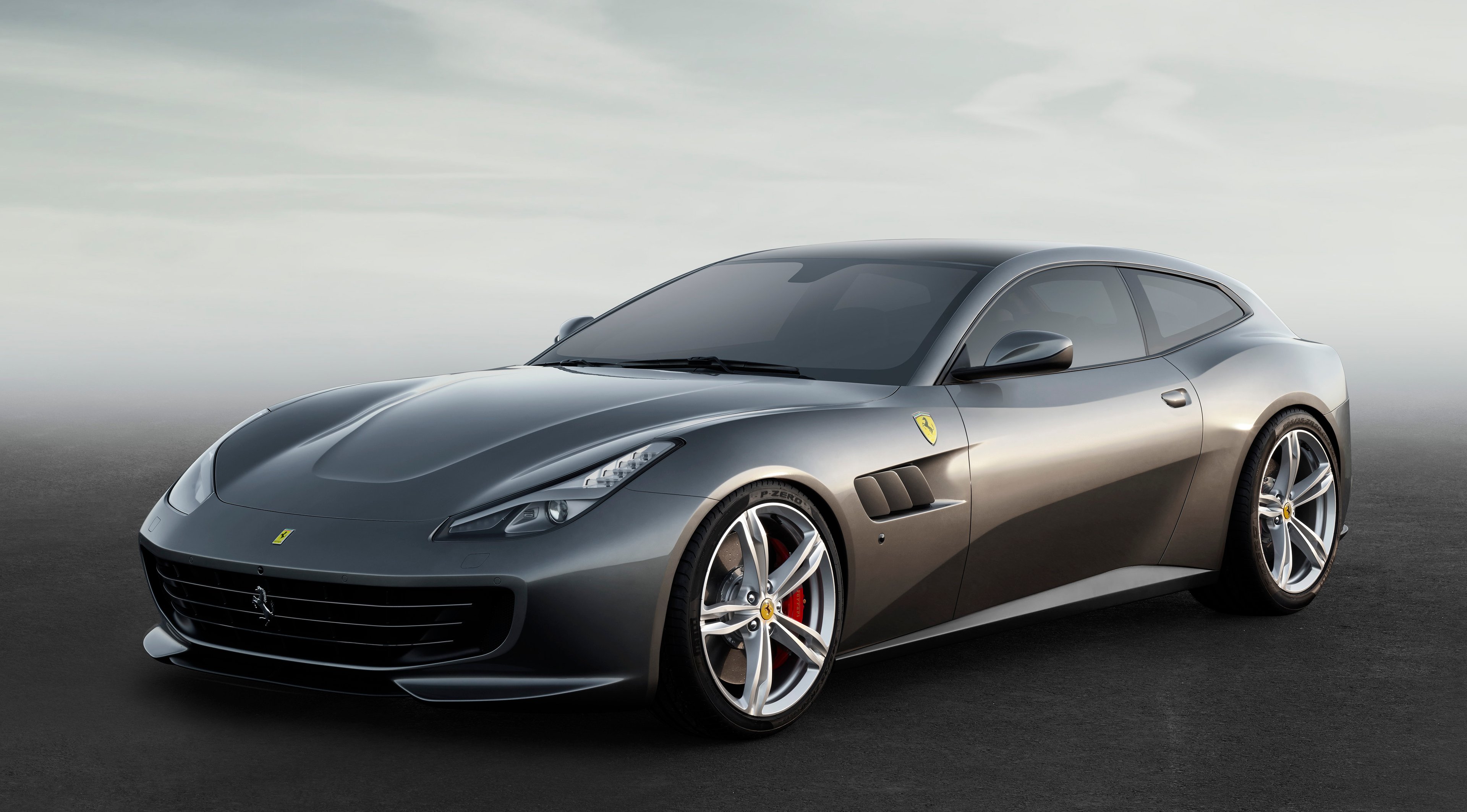 A silver Ferrari GTC4Lusso, a 12-cylinder-powered four-seat sports car. 