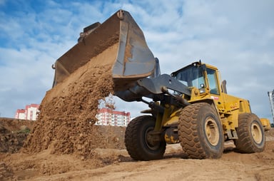 Earthmover Dumping Dirt
