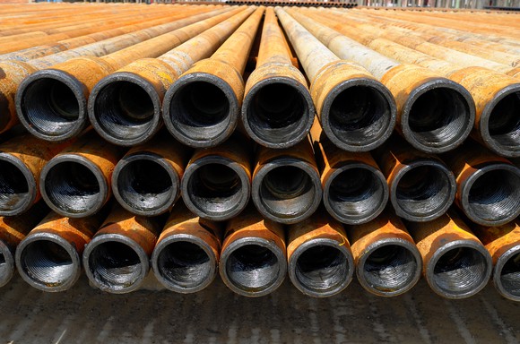 A stack of steel drill pipes