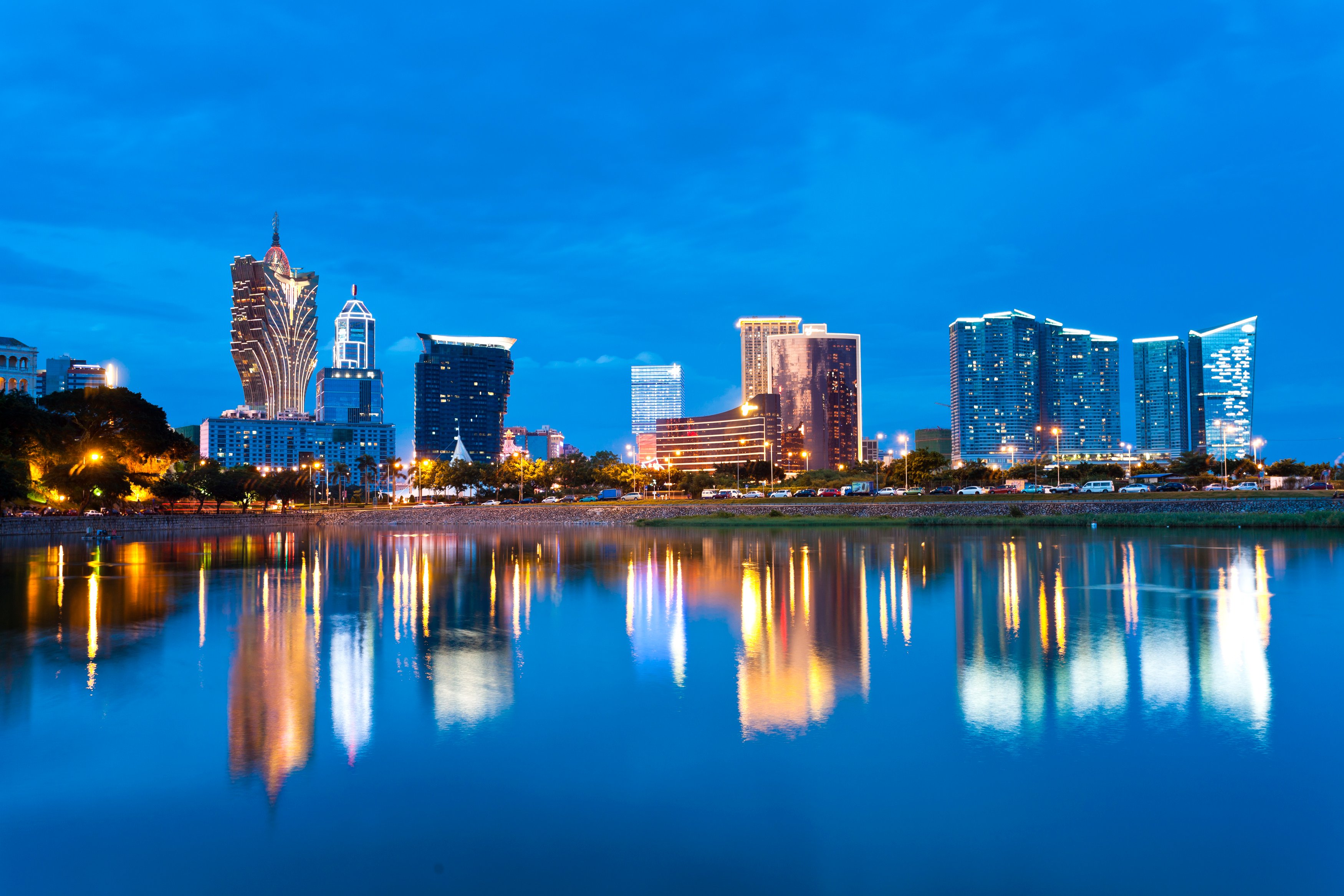 Macau's skyline over the water at night. 