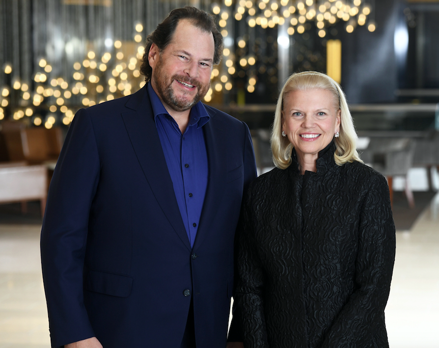 Salesforce CEO Marc Benioff and IBM CEO Ginni Rometty stand side by side