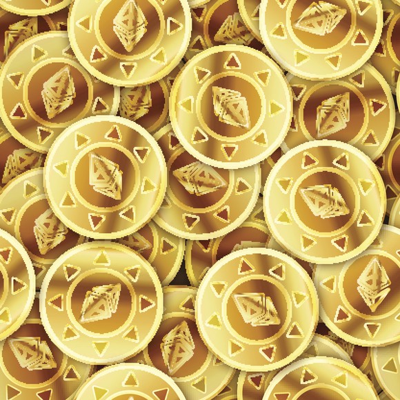 Many bright gold coins with Ethereum symbol on them.