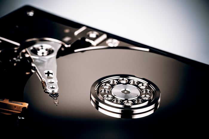 A hard drive with the case taken off, displayed in dramatic Film Noir lighting.