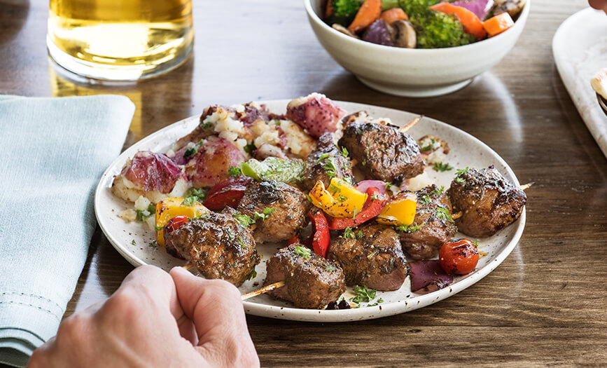 A steak kebab dish from Zoe's Kitchen
